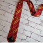 Галcтук с гербом ГРИФИНДОР Gryffindor / Harry Potter ГАРРИ ПОТТЕР красный в клетку  с регулировкой (ІІ) 33894